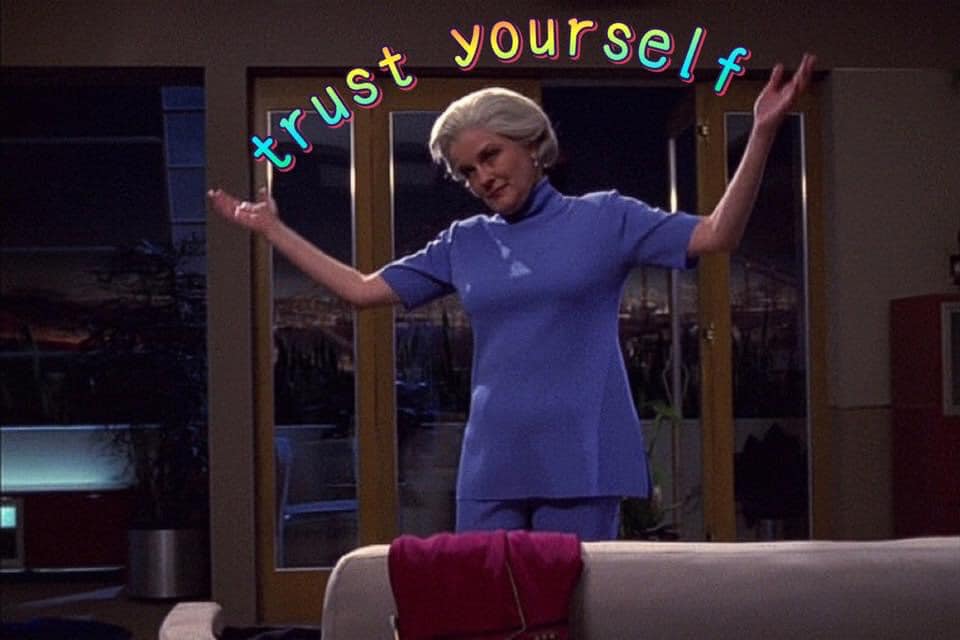 The meme features a still image of a character from the TV show Star Trek: The Next Generation, Deanna Troi, standing in a dramatic pose with her arms outstretched. The text "I find your lack of faith disturbing" is not present, but instead, the phrase "I find your lack of trust disturbing" is not there either. The actual text is "Trust yourself".